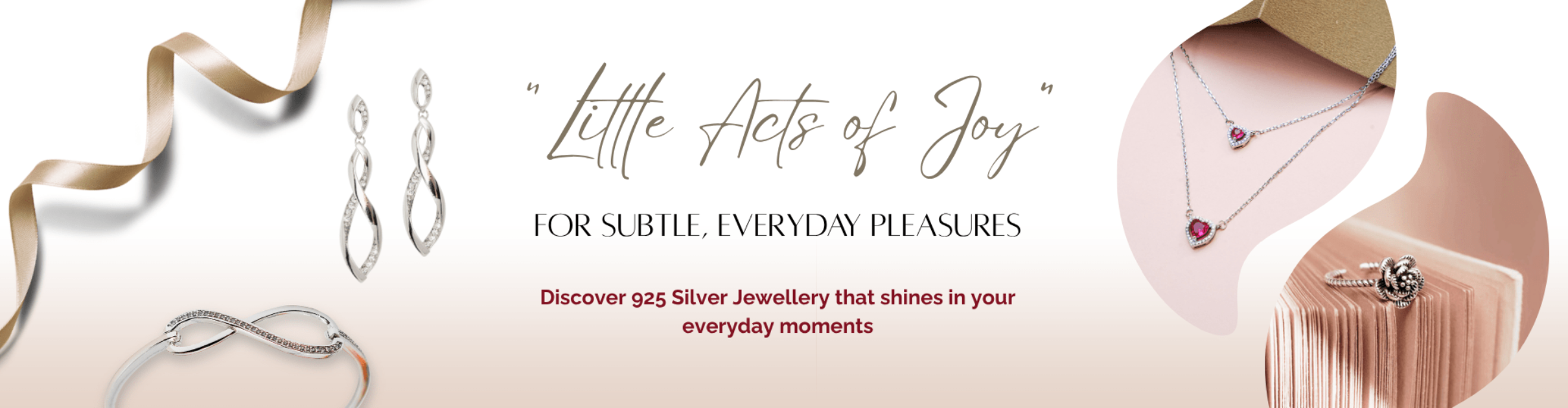 silver jewelry with necklaces and earrings on a light background.